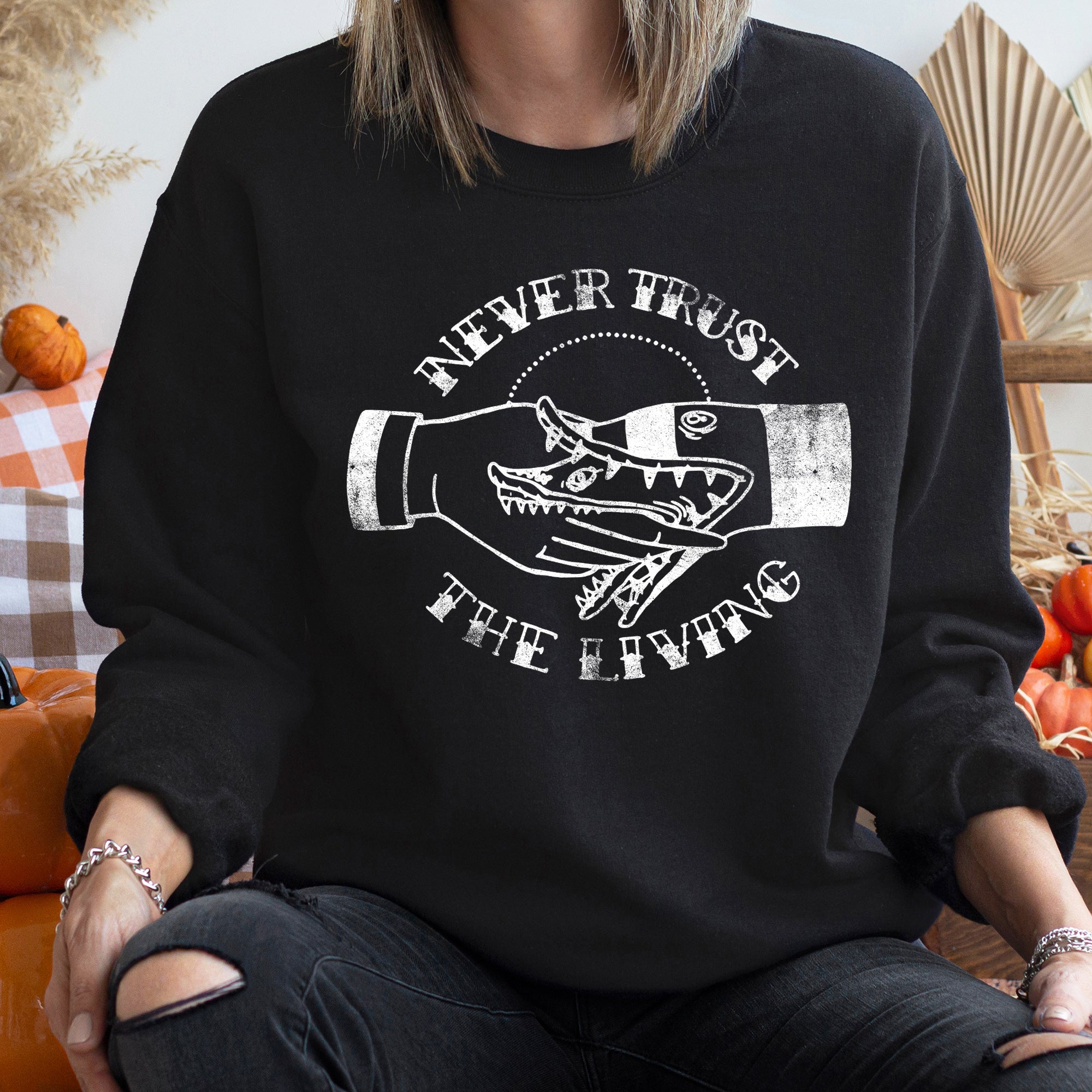 Never Trust The Living Halloween Sweatshirt